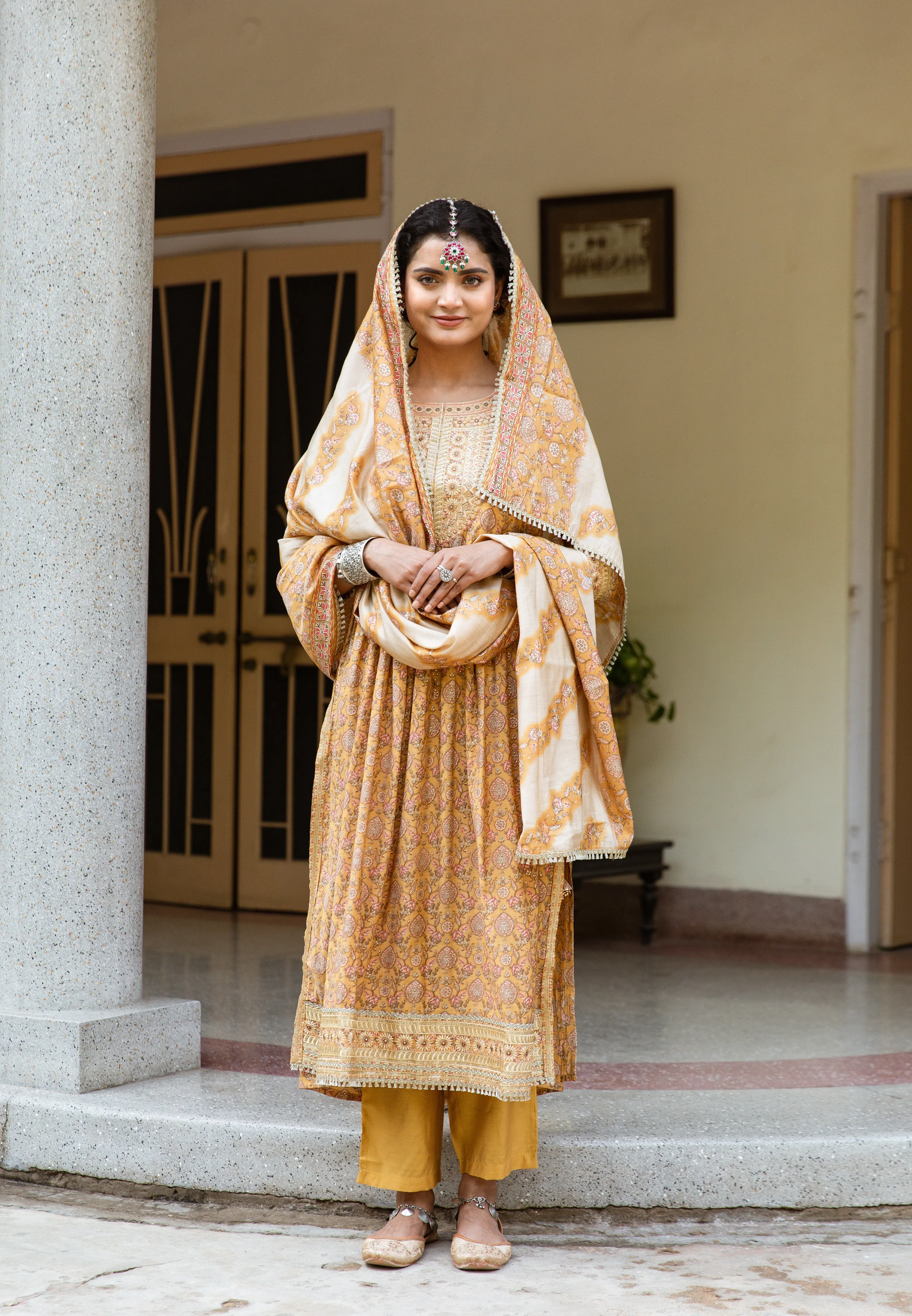 Women Mustard Chanderi Nyara Cut A-Line Kurta Trouser Dupatta & Fancy Potli Set